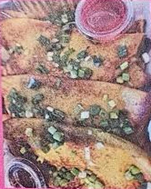 Garlic bread topped with green onions